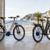 Due e-bike a confronto con motore centrale e motore nel mozzo posteriore